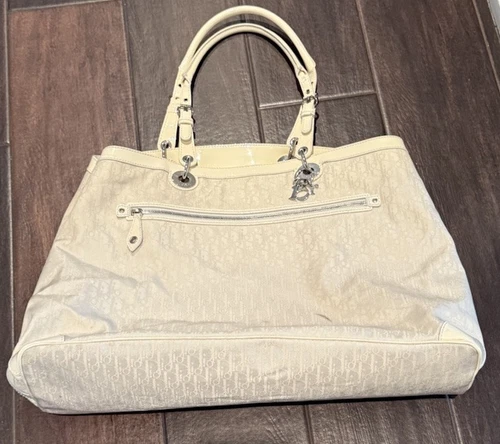 SAC FOURRE TOUT DE VOYAGE CHRISTIAN DIOR DIORISSIMO TOILE IVOIRE CUIR VERNI