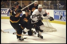 Defenseman Dana Murzyn Vancouver Canucks left winger Eric Lacroix - Old Photo