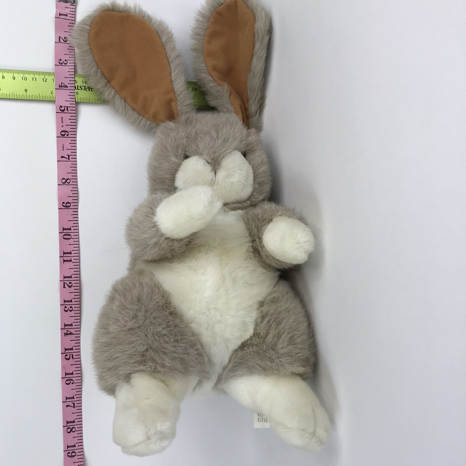 anna club plush the leather tag line dog