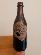 Coca Cola SS Amber Bottle w / Label Roanoke VA