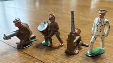 Lot of 4 Vintage Metal Dimestore Toy Soldiers - 2 marked Manoil.