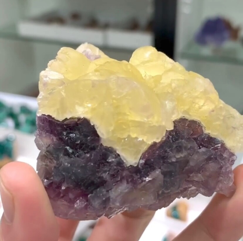 Natural purple fluorite with rare yellow secondary crystals