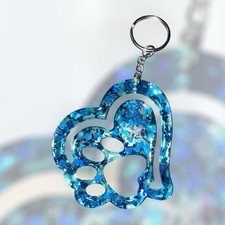 Blue resin keychain with heart and paw design always remember your fur baby