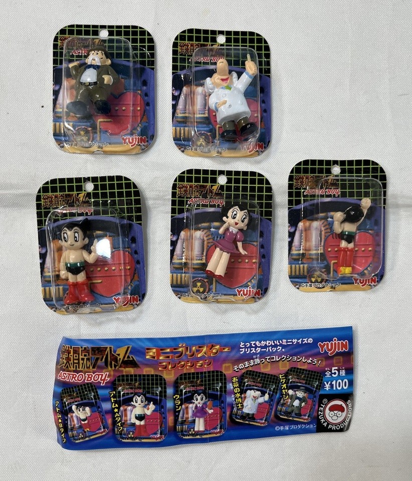 A 1998 Yujin Astro Boy mini figure set — genuine vintage Tezuka merchandise that's a tiny slice of manga history and a grail find for anime collectors.