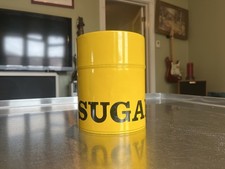 vintage yellow tin sugar canister