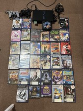 Sony PlayStation 2 PS2 PAL Console + 32 games - Monopoly War Monsters Snowboard