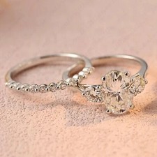 Oval & Round Cut Moissanite Three Stone Engagement Ring In 14K White Gold Plated