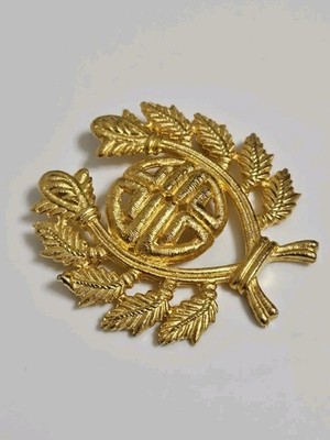  Vintage 1980s Givenchy 4G Logo Laurel Wreath brooch.