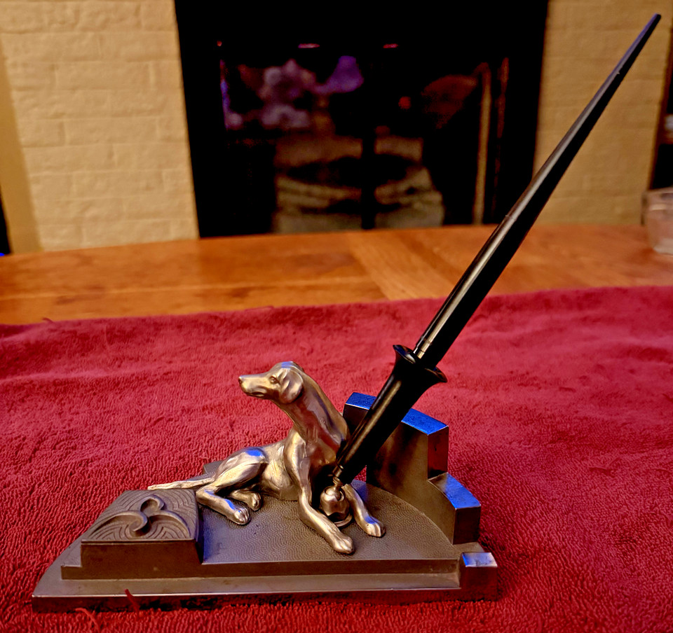 A Maitland-Smith Art Deco greyhound pen holder/inkwell is a serious collectible — this label commands museum-quality craftsmanship and serious shelf presence.