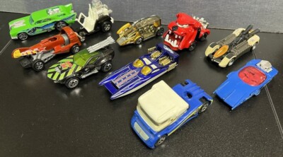 Hot Wheels Unique Cars: 9 different cars, various colors and types.