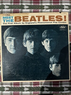Meet The Beatles The First Album by England's Phenomenal Pop Combo