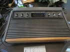 Atari 2600 Woodgrain Consol NOT TESTED comes with what is shown