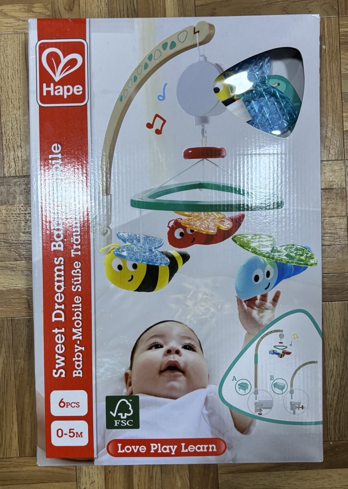 Mobile bébé musical HAPE bois mélodie apaisante pour nouveau-né