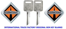 OEM 2 ORIGINAL INTERNATIONAL TRUCK FACTORY KEY BLANKS WHITE LOGO.