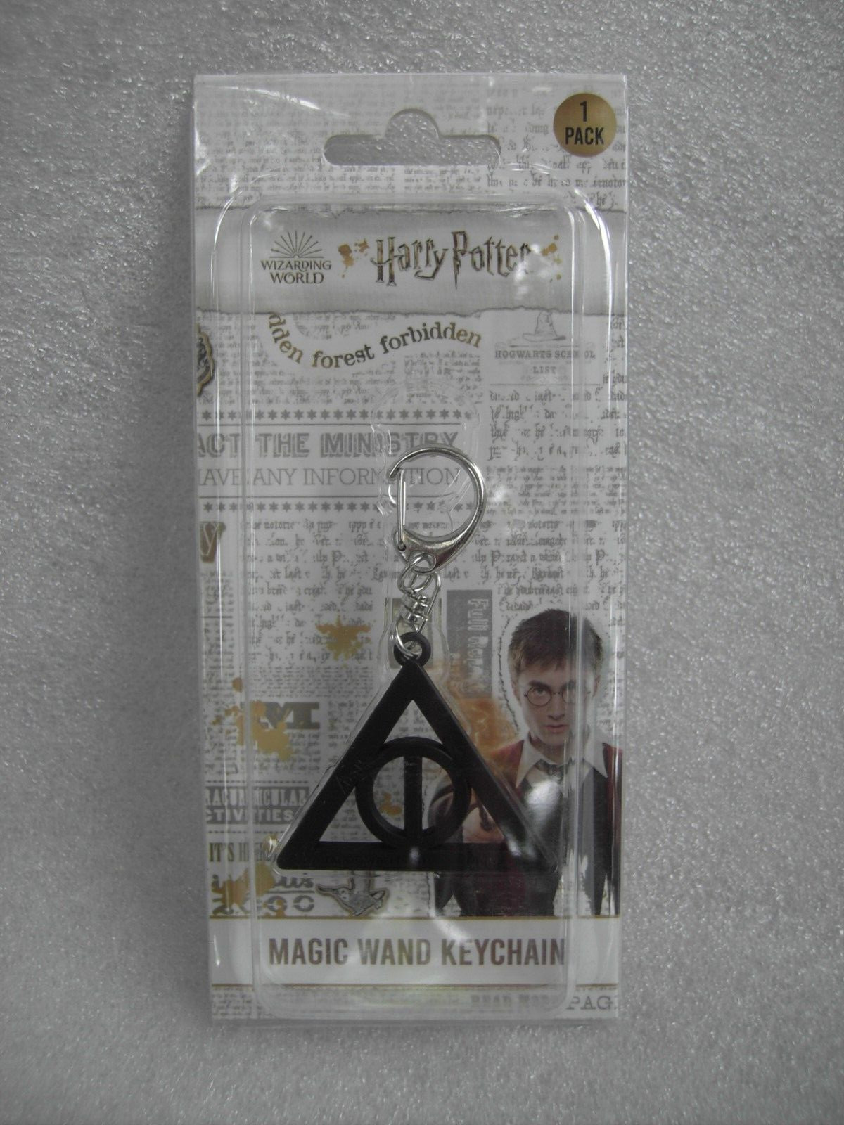 HARRY POTTER SAGA MAGIC WAND KEYCHAIN DEATHLY HALLOWS SIMBOLO DONI DELLA MORTE
