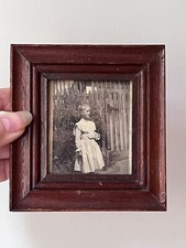 Antique photo girl in white dress by the fence in wooden frame 4 1/4”x4,5”