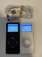 Lot of 2 Apple iPod nano 1st Generation Black 1 GB and White 2 GB LCD spots