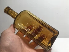 Antique Applied Lip Mrs. S.A. Allen’s World Hair Restorer Bottle.