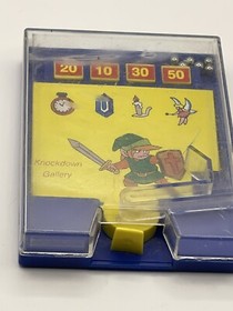 The Legend of Zelda Nintendo NES Era Knockdown Gallery Juego Port&aacute;til
