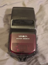 Minolta Maxxum 3500 xi Flash with stand and case.