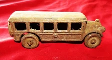 ANTIQUE A.C. WILLIAMS CAST IRON FIVE WINDOW TOUR BUS WITH METAL WHEELS - 5" LONG