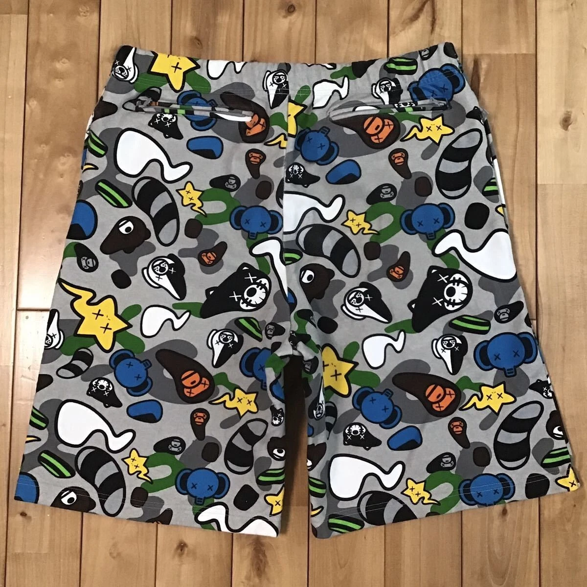 BAPE × kaws milo animal kingdom sweat shorts A Bathing Ape Size L