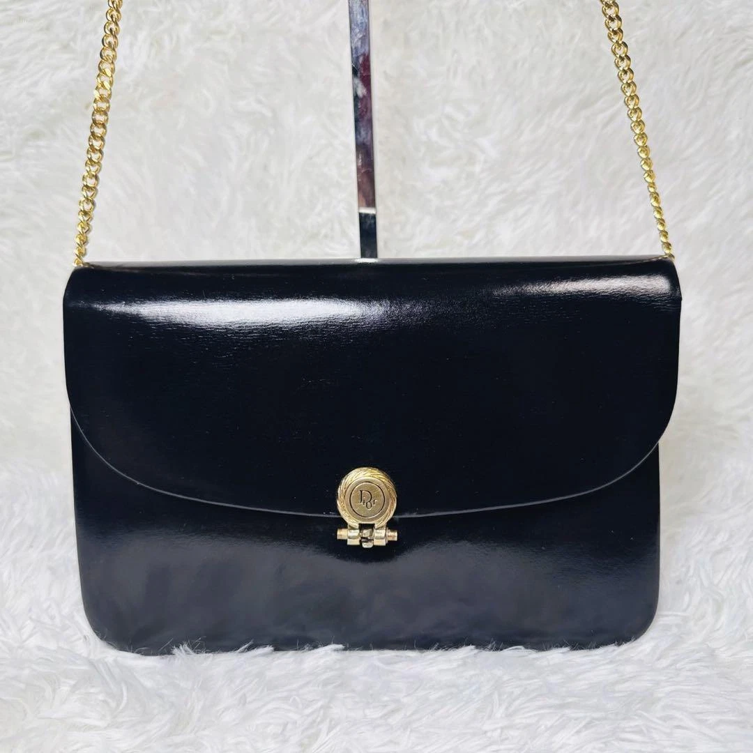 Sac bandoulière vintage Christian Dior chaîne cuir noir or quincaillerie