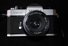 Yashica TL Electro 35mm SLR Film Camera w/ Yashinon 50mm and Telephoto lens.