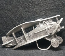 XE17157 NOS VINTAGE 1981 CUT-OUT AIRPLANE BIPLANE ARTWORK MENS BELT BUCKLE