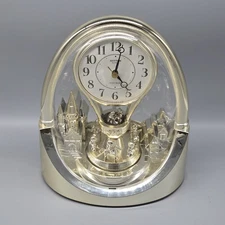 Rhythm Quartz Clock Rotating Pendulum Musical Disney Castle "It's A Small World"