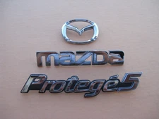 2002 2003 MAZDA PROTEGE 5 REAR CHROME EMBLEM LOGO BADGE SIGN 02 03 USED A47336