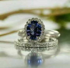 2Ct Oval Cut Lab-Created Blue Sapphire Bridal Ring Set In 14k White Gold Plated