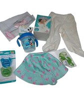 Infant/Toddler care bundle lot of 7. Clothes, pacifiers, cup, pump, bow, teether