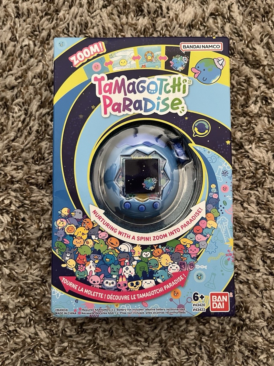 TAMAGOTCHI PARADISE PINK LAND US VERSION IN HAND for sale online