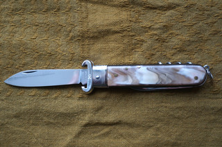 CUCHILLO PLEGABLE CON EXTRACTORES SHOTSHELL ROSA (ITALIA)