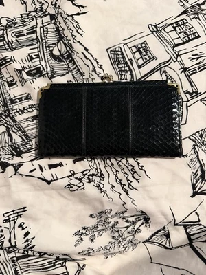 vintage clutch resembles a Judith Leiber snakeskin bag with gold metal hardware. - Image 1 of 4