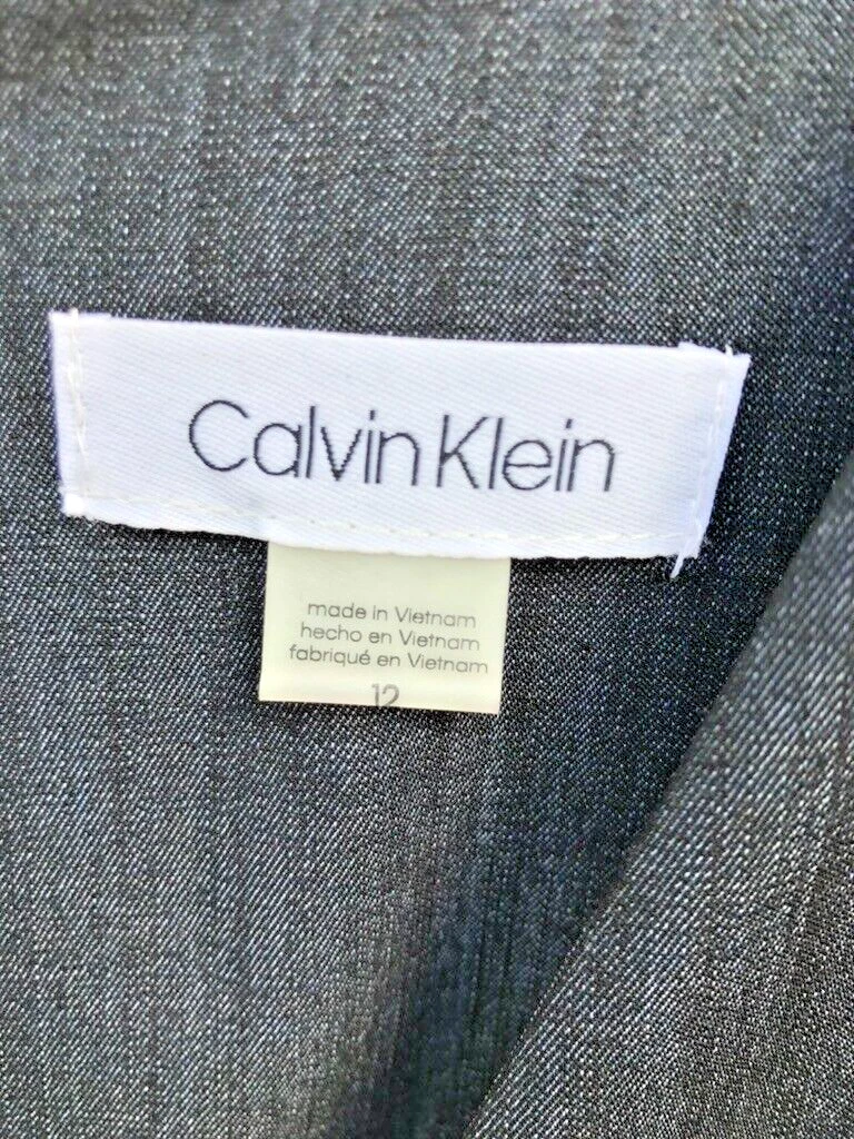 UNDERCOVER Abito da donna blu scuro nuovo con etichette Calvin Klein taglia 12 look denim tasche nascoste