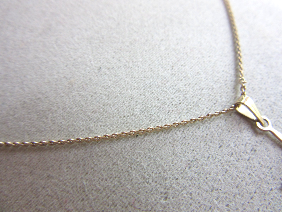 Shima 14kt gold Cross with diamond chip center w/ serpentine chain 1.8 ...