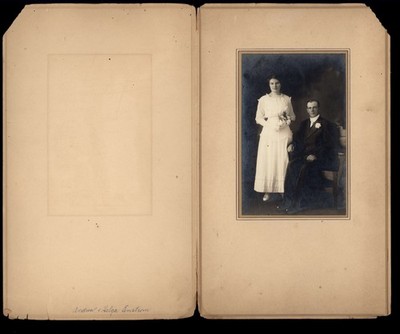 WEDDING PHOTO in folio name written ANDREW + HELGA ENSTROM no location