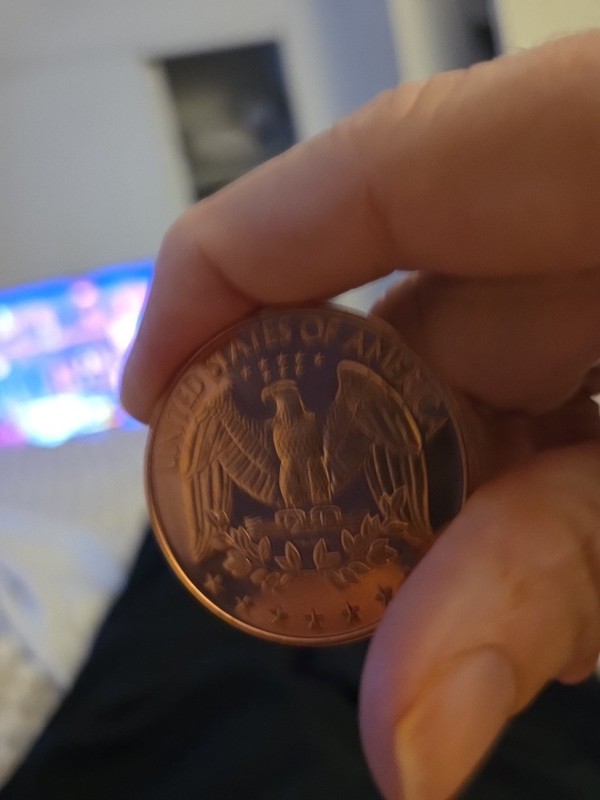 Copper Round With The American Flag On It Its Got The American Eagle On The Back