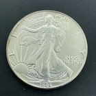 1986 American Silver Eagle .999 1 Troy Oz Fine Silver First Year