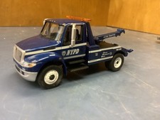 NYPD 1/64 International durastar 4400 tow truck wrecker blue  police loose