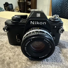 Nikon EM 35mm SLR Film Camera w/ Nikon Series E 50mm f/1.8 Lens - Black