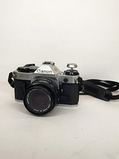 Canon AE-1 35mm SLR Film Camera FD 50mm f/1.8 Lens Silver Black Vintage