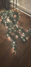 Two 9-Foot Sections.Pre-lit clear incandescent bulbs Xmas Garland. 18feet total