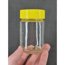 Small Clear Glass Storage Jar with Bright Yellow Screw Top Lid 3.75 inch