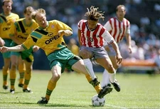 Cobi Jones USA rides the tackle of Hans Pfluger of Bayern Munich B- Old Photo