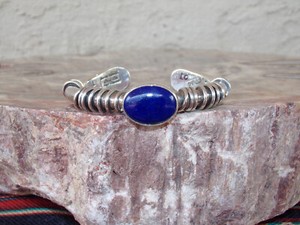 ORVILLE TSINNIE (1943-2017) Sterling Silver & Lapis Bracelet - 6 inch - 67 Grams