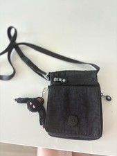 Kipling Small multi-pocket Black Nylon Monkey Crossbody Bag.