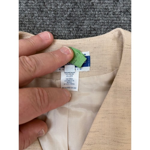 Tan 12 polyester blend pant suit blazer with notch lapels, front button closure, and white VTG label on inner collar.